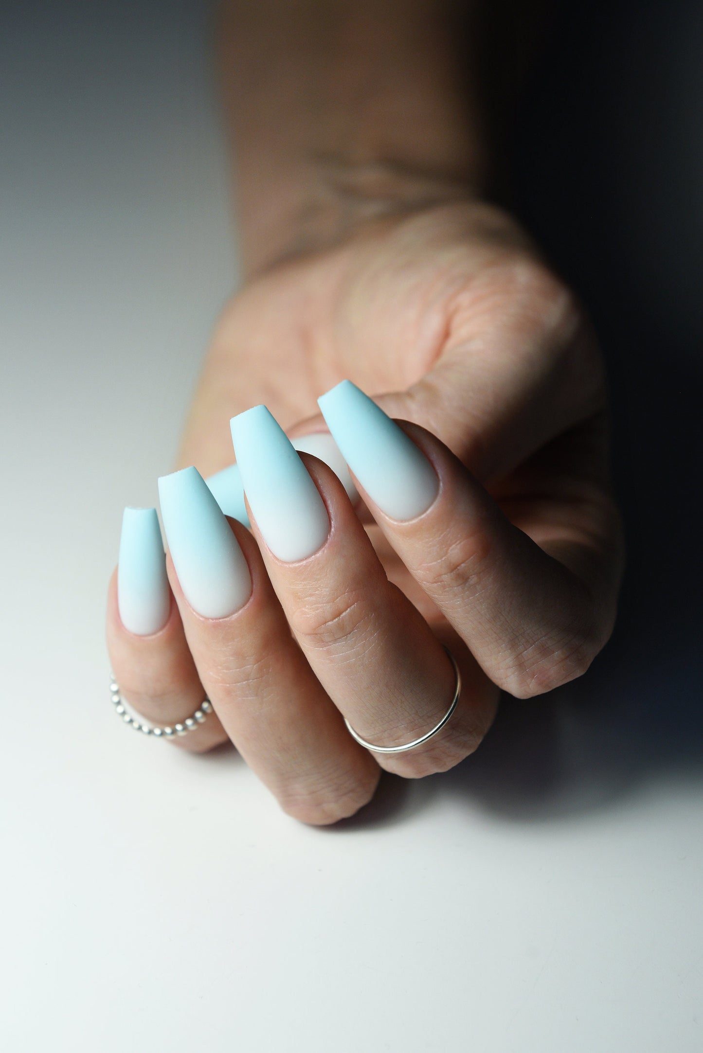 Blue Ombre winter snowy strong as salon acrylic manicure set of 10 gel press on nails with gradient. Reusable natural looking glue on long