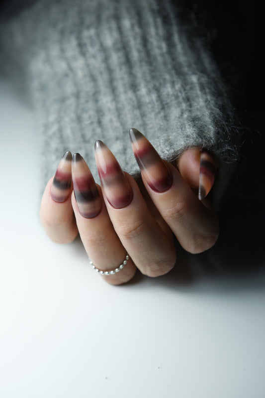 Hand-painted mohair sweater-inspired press-on nails in long almond shape
